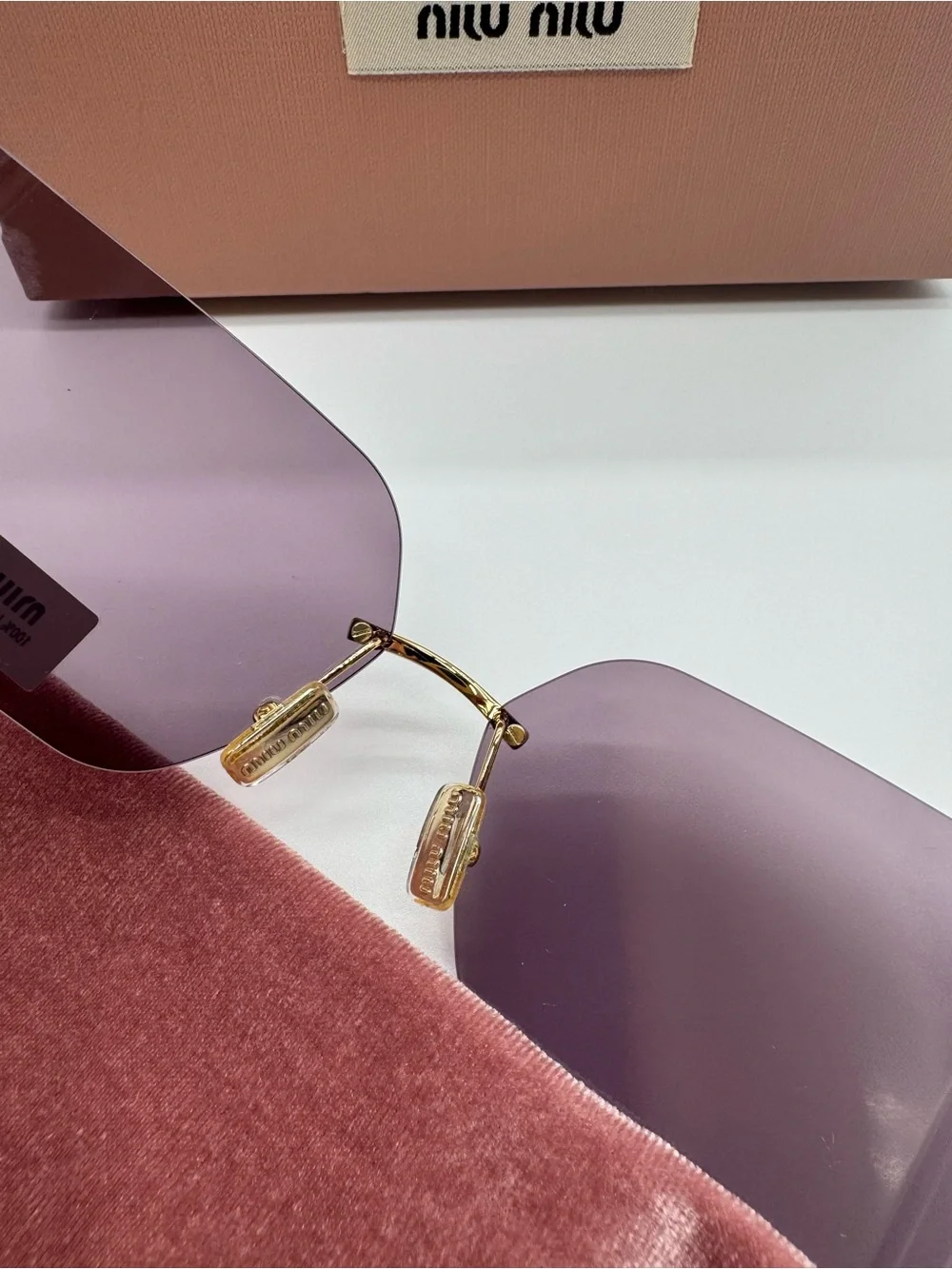 Miu Miu Purple Rimless Sunglasses with Gold Accents